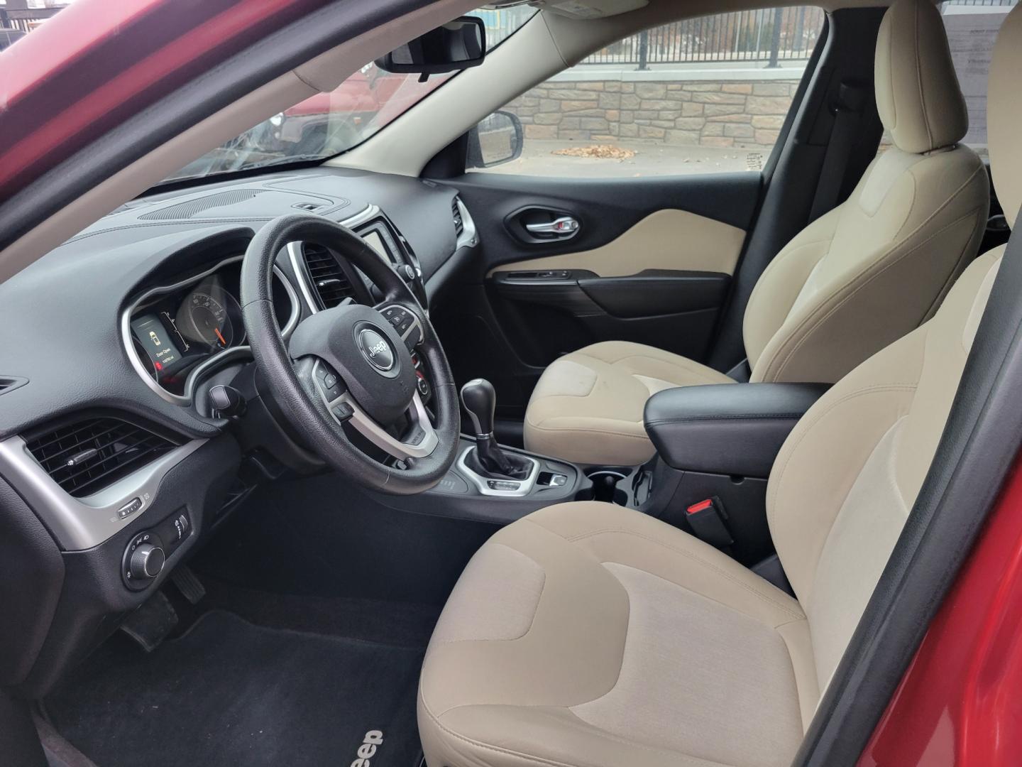 2016 Maroon /Tan Jeep Cherokee Sport (1C4PJMAB9GW) with an 2.4L I4 engine, 9 Speed Automatic transmission, located at 450 N Russell, Missoula, MT, 59801, (406) 543-6600, 46.874496, -114.017433 - Clean 4 Wheel Drive SUV. Air. Cruise. Tilt. Power Windows and Locks. Bluetooth. Backup Camera. - Photo#12